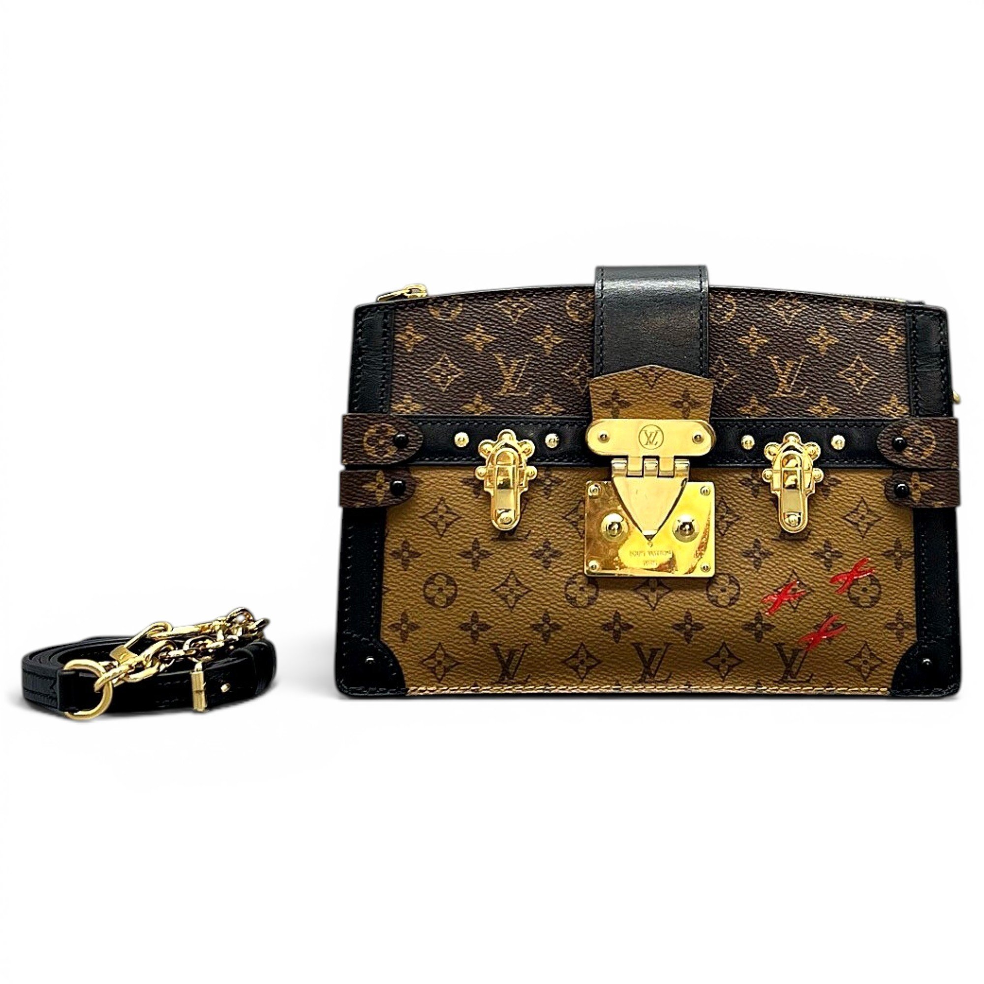 Pochette Trunk leather handbag