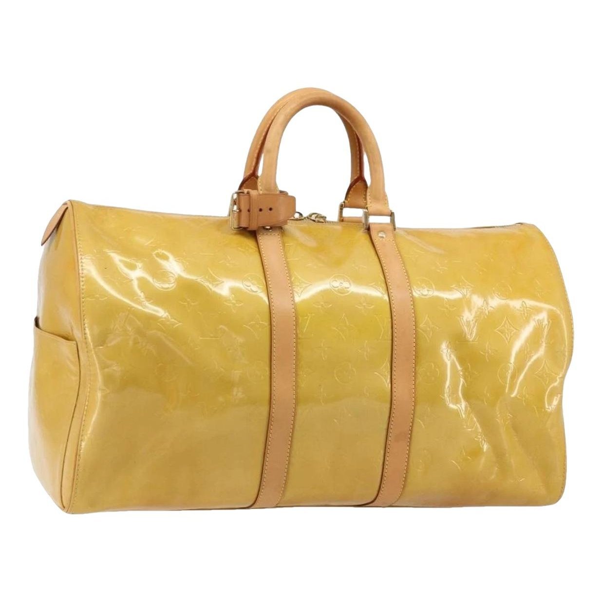 Patent leather travel bag