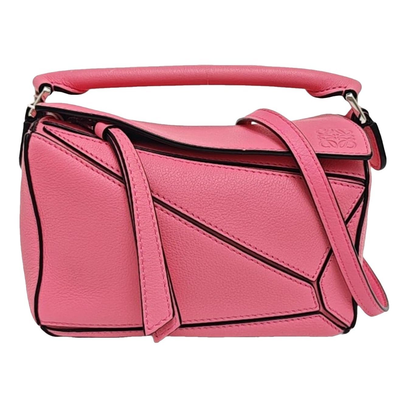 Puzzle leather handbag
