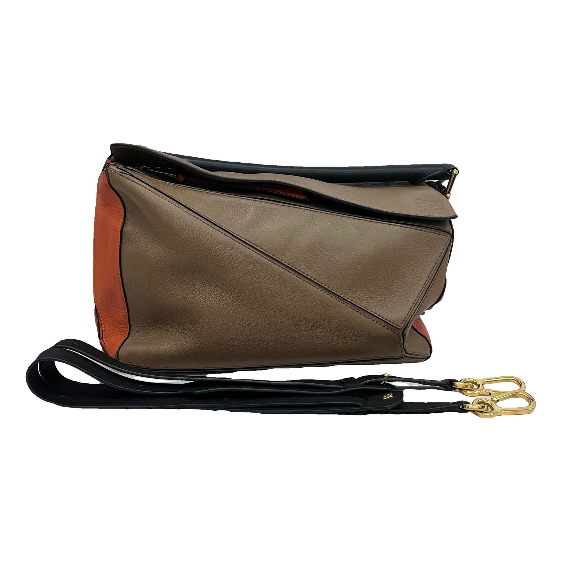 Puzzle leather handbag