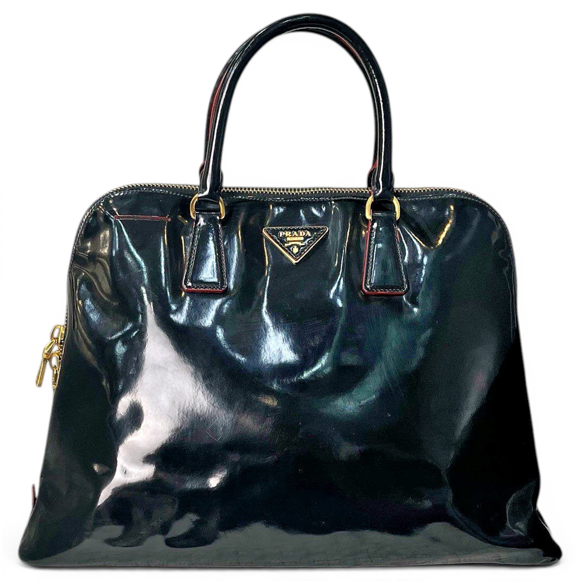 Pyramid patent leather handbag