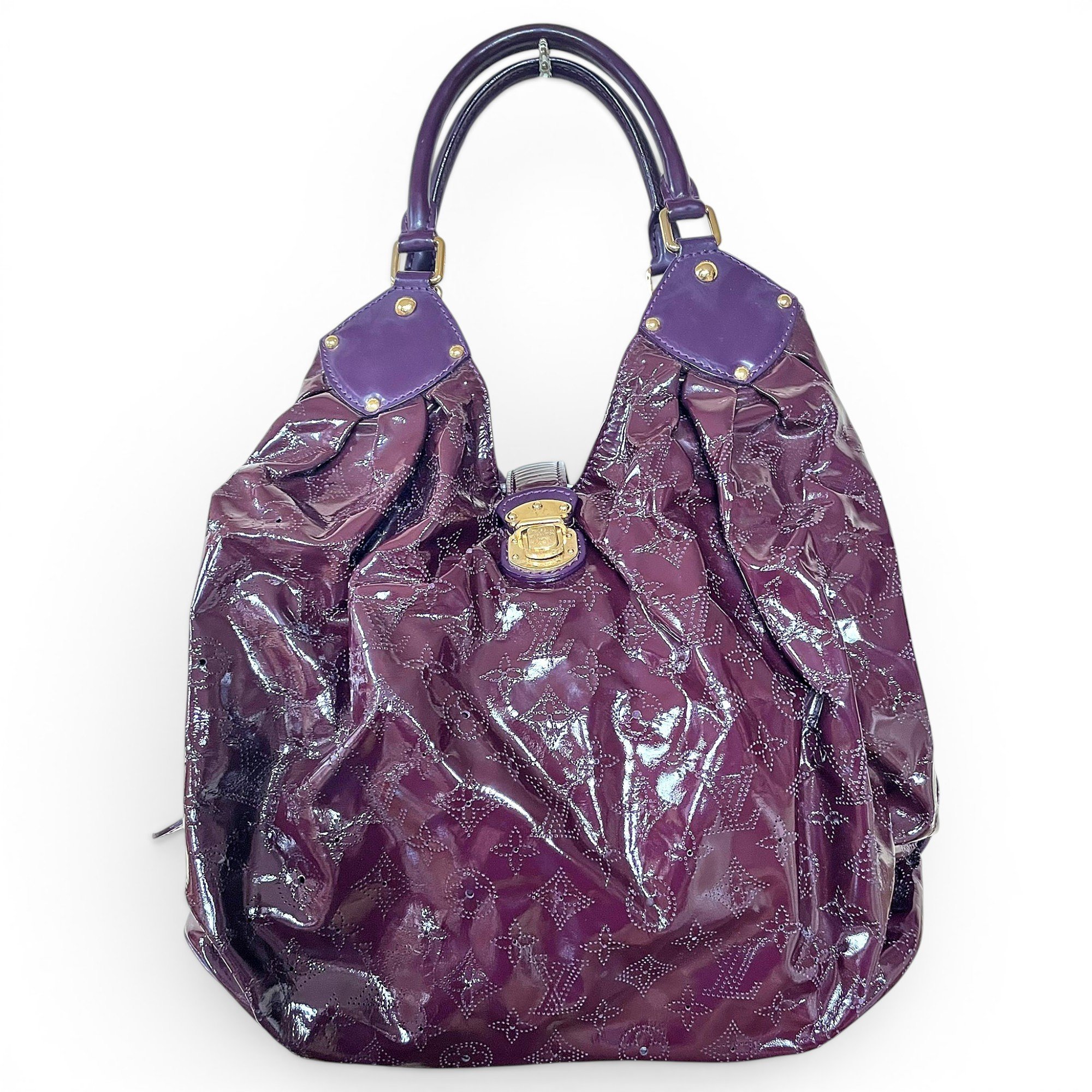 Surya patent leather handbag