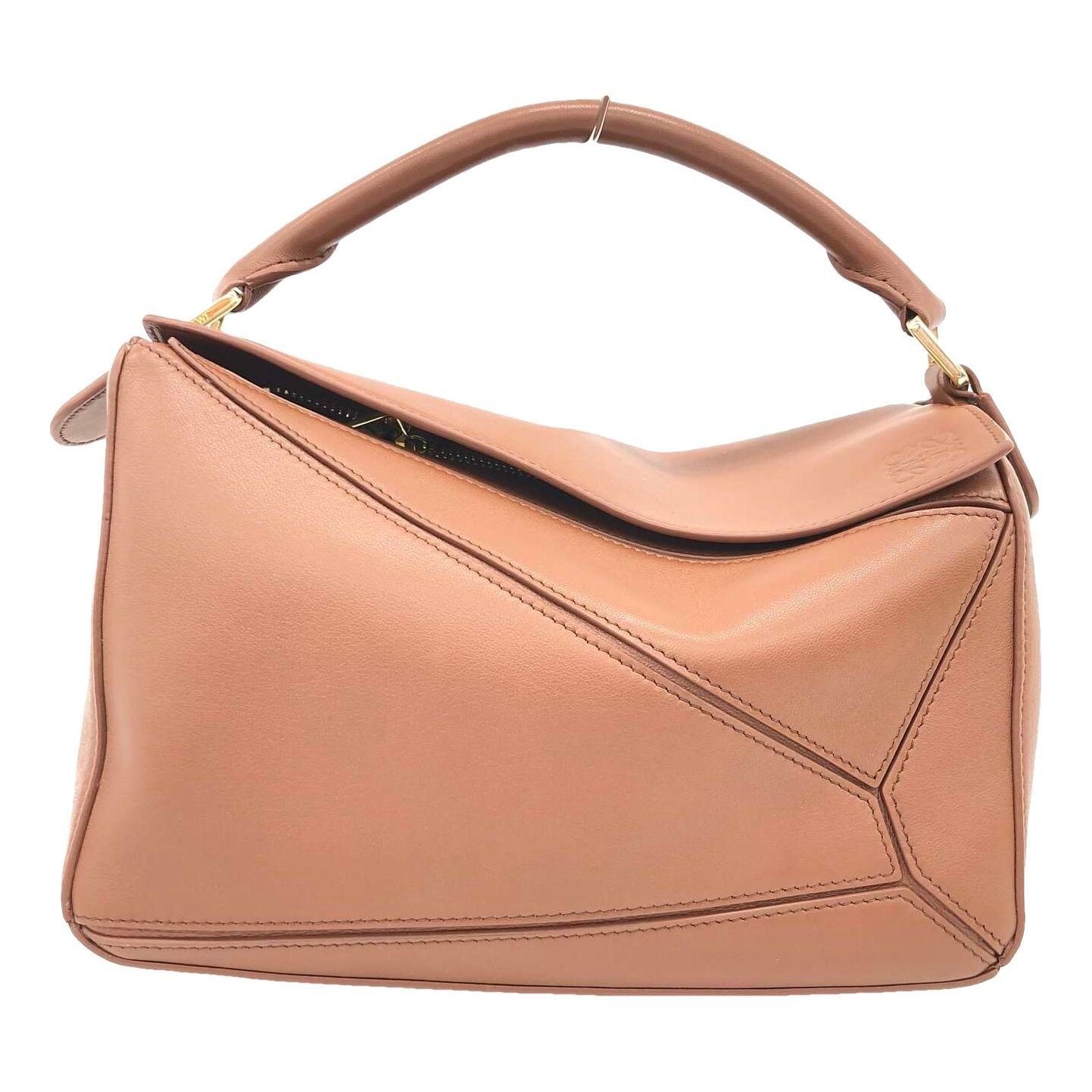 Puzzle leather handbag