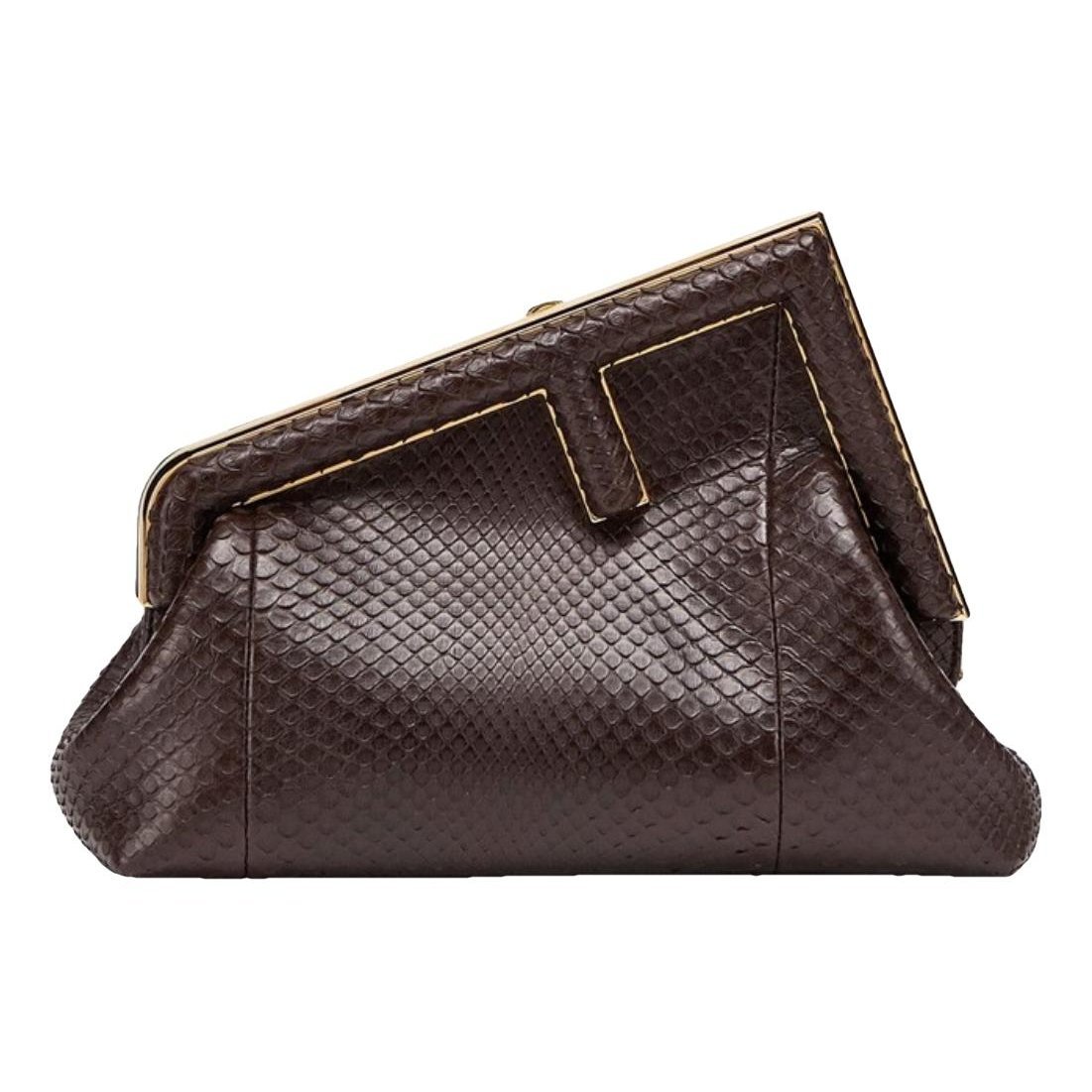 First leather handbag