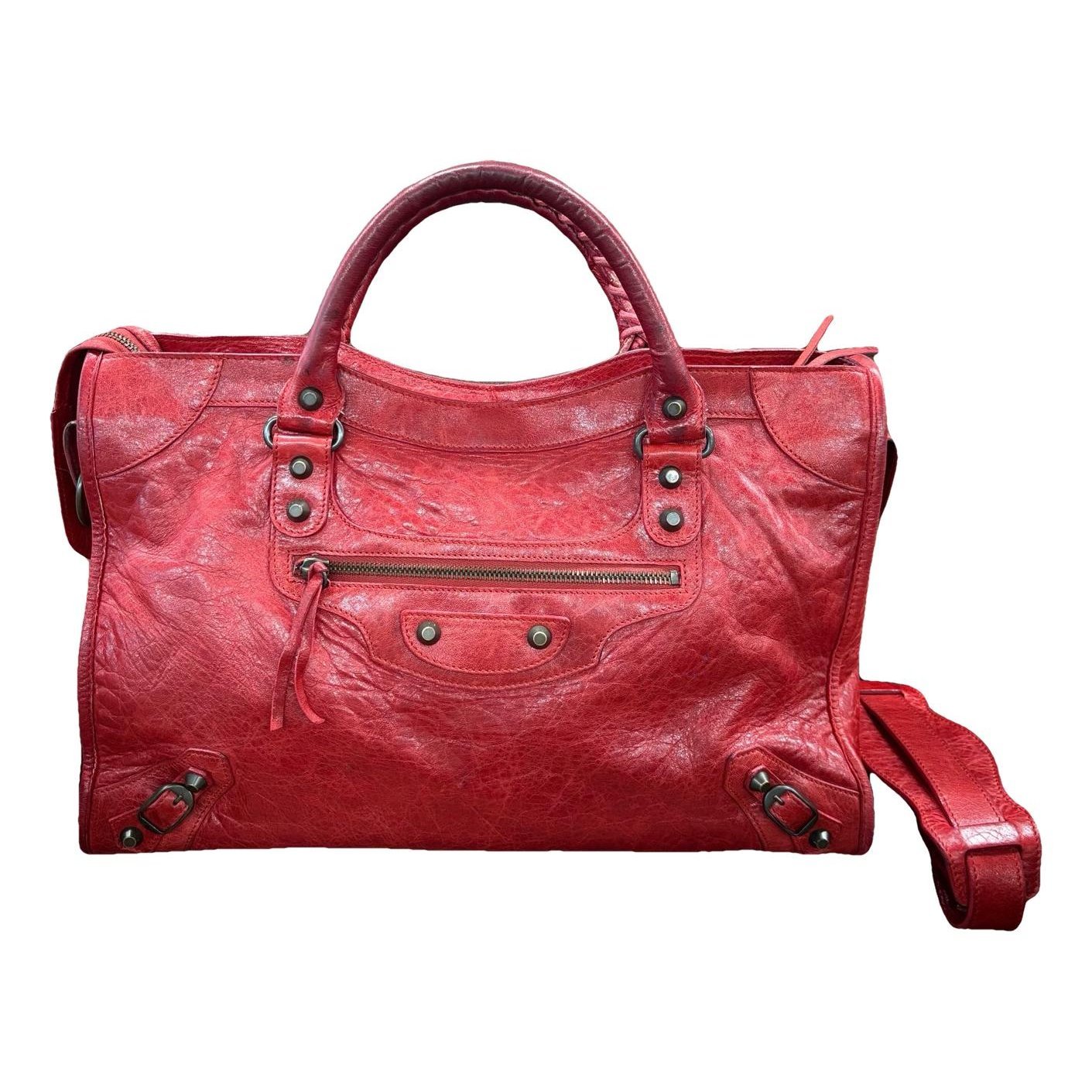 First leather handbag