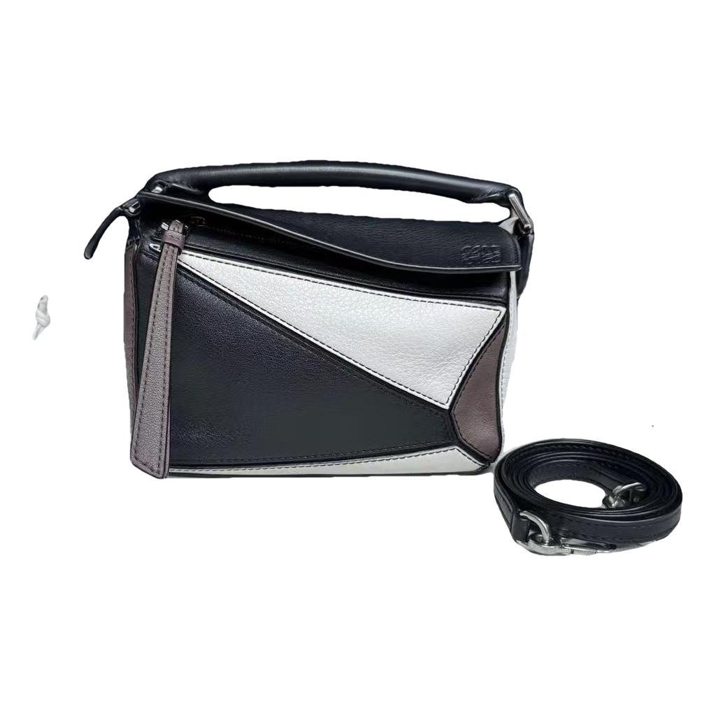 Puzzle leather handbag