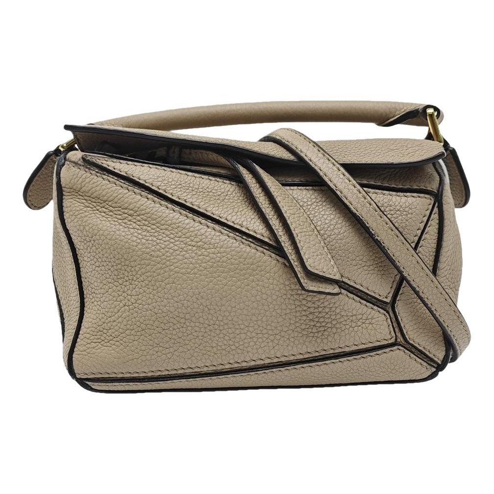 Puzzle leather handbag