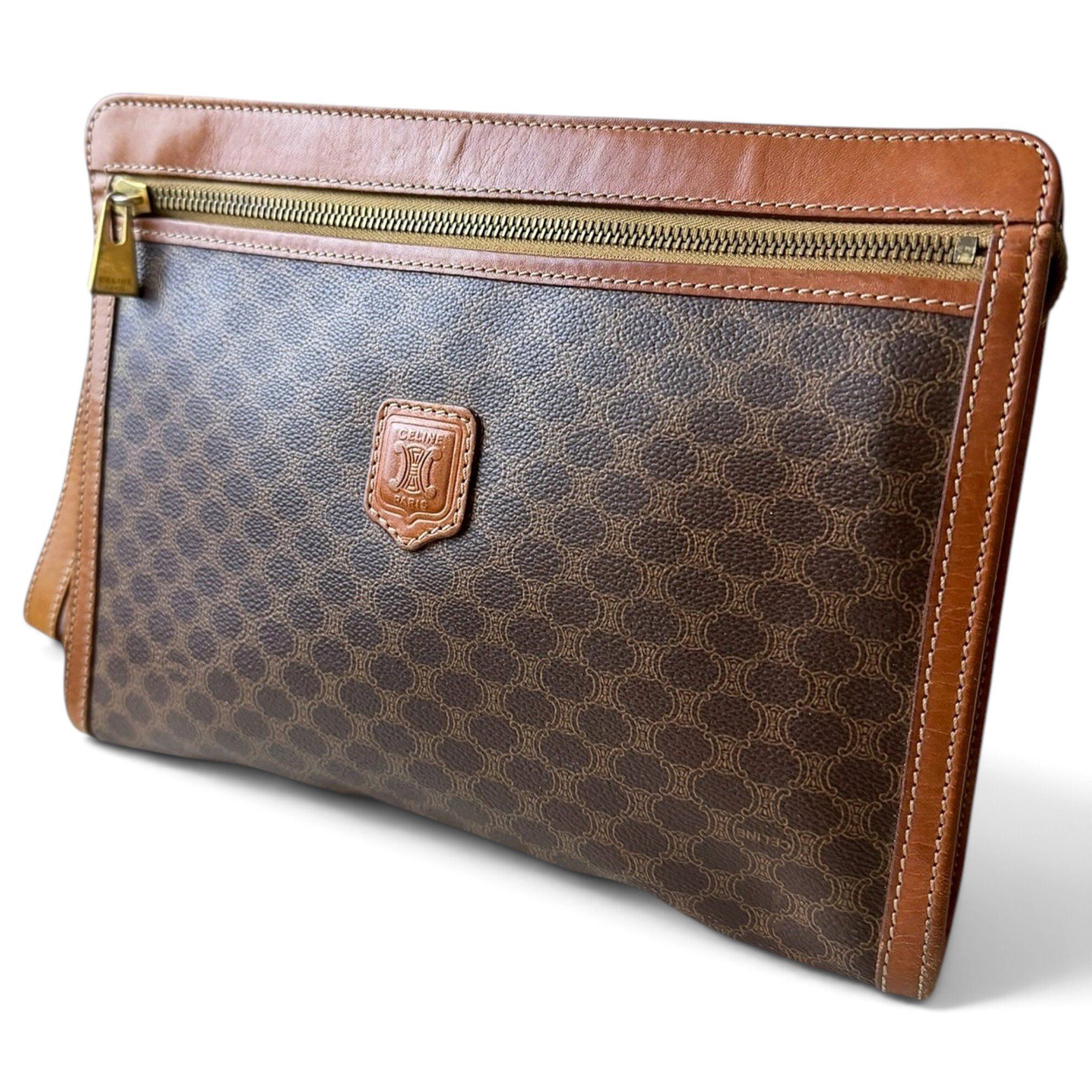 Triomphe Vintage leather clutch bag