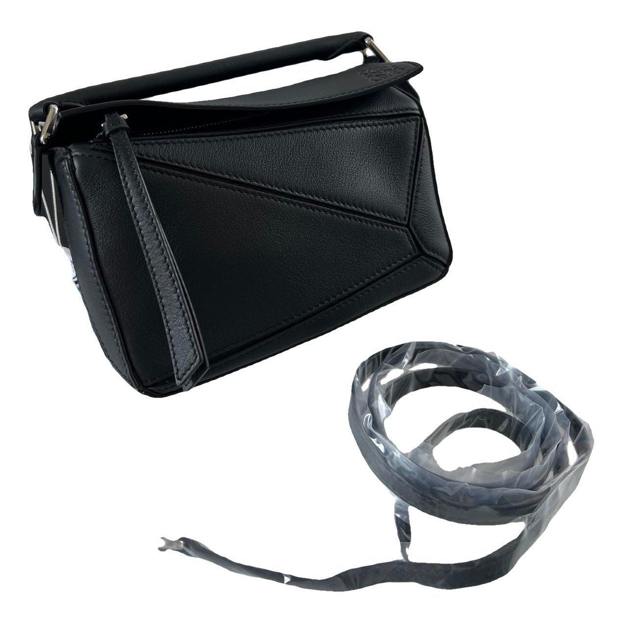 Puzzle leather handbag