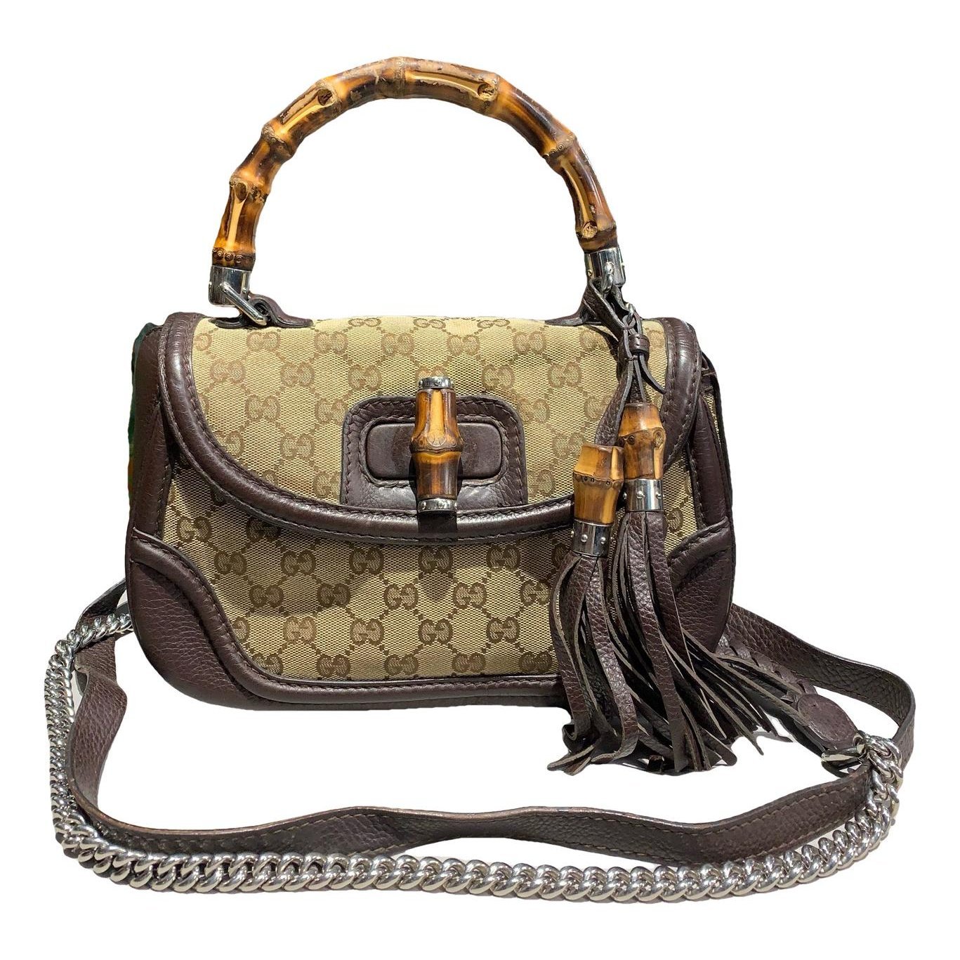 Convertible Pompon Bamboo Top Handle leather handbag