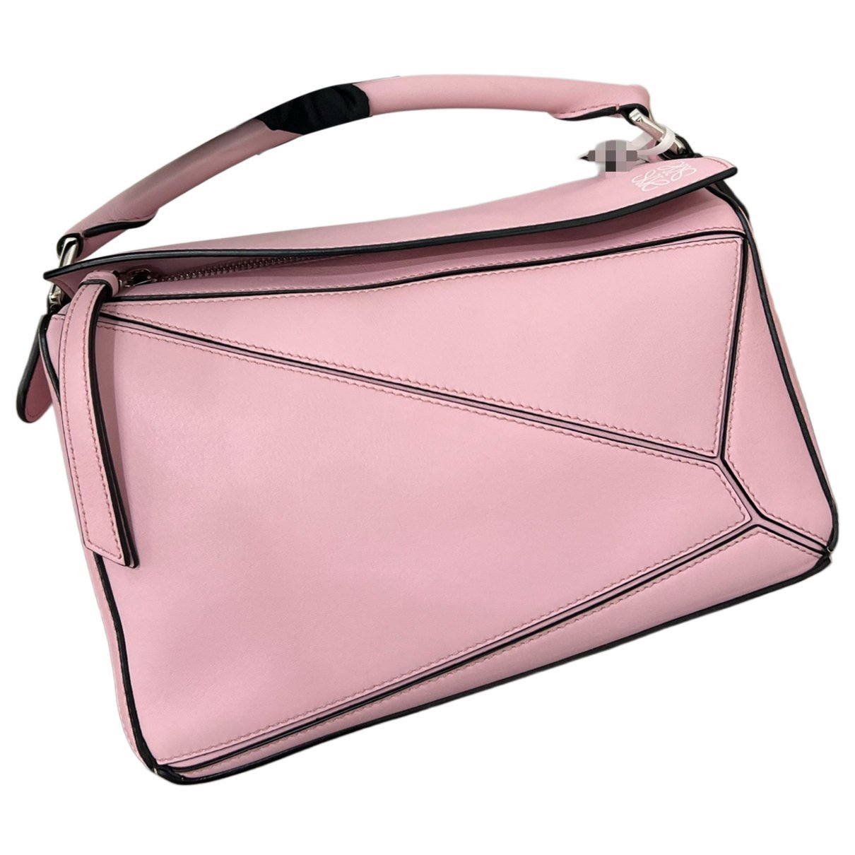 Puzzle leather handbag
