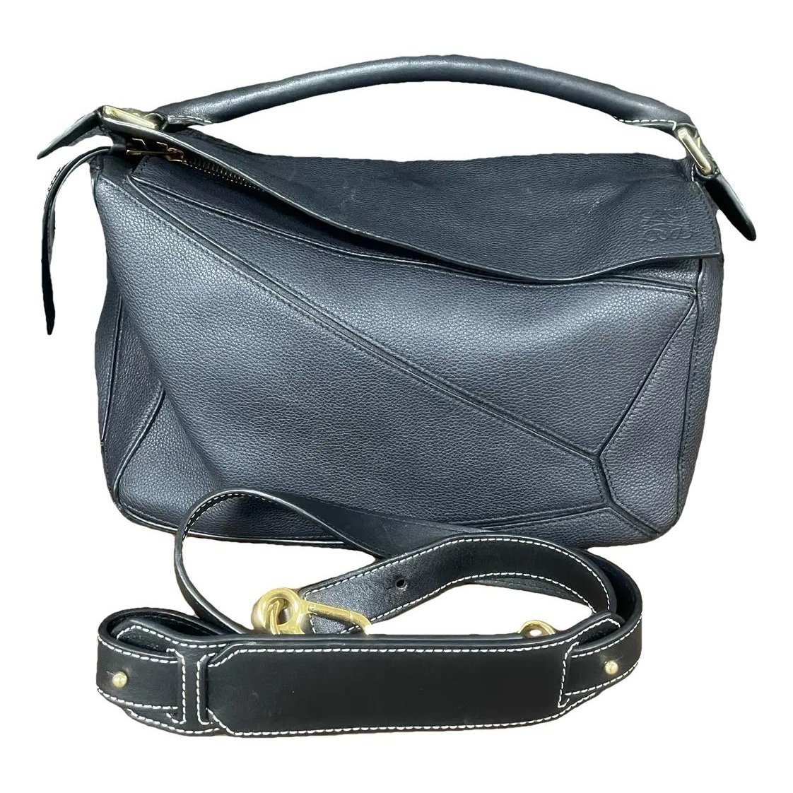 Puzzle leather handbag