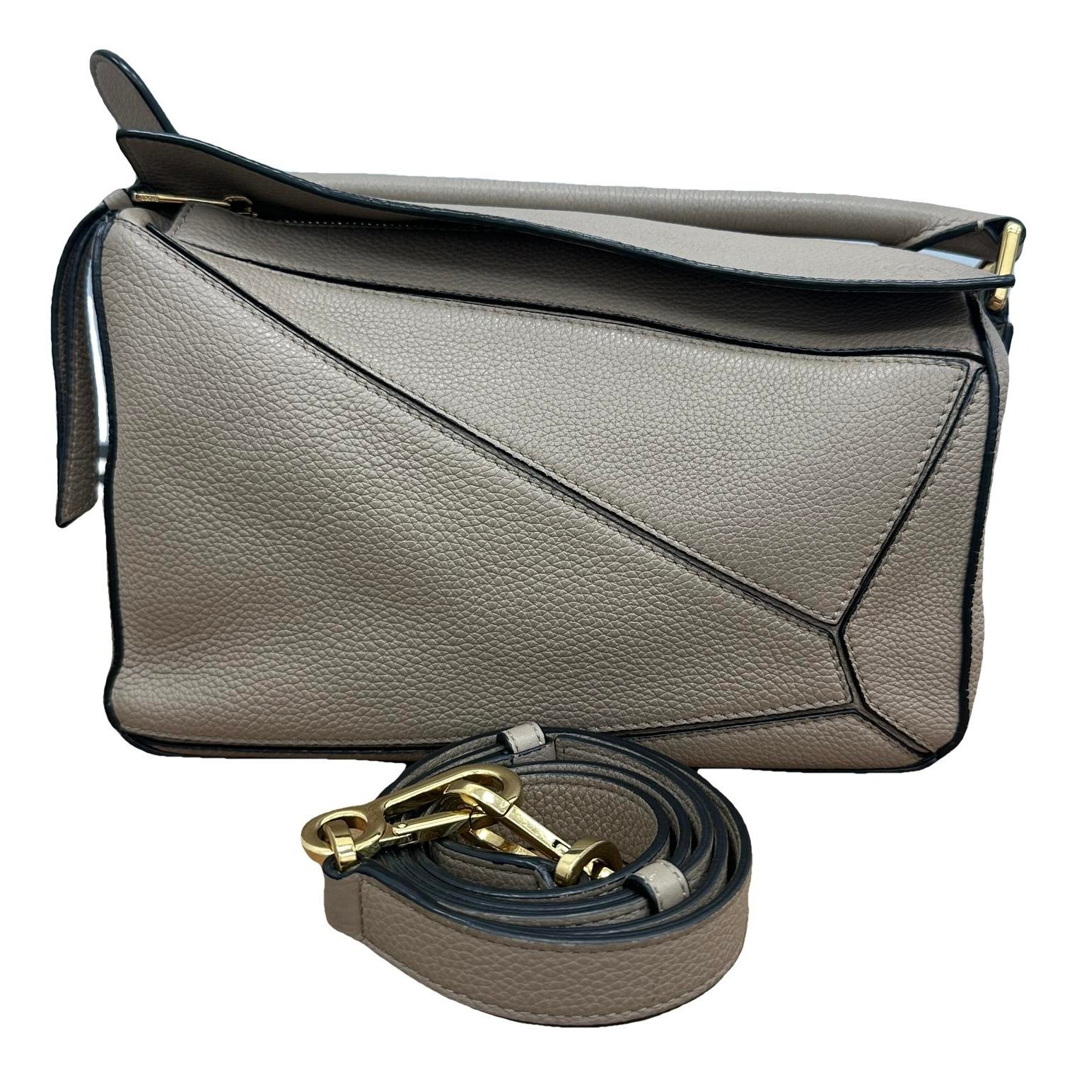 Puzzle leather handbag