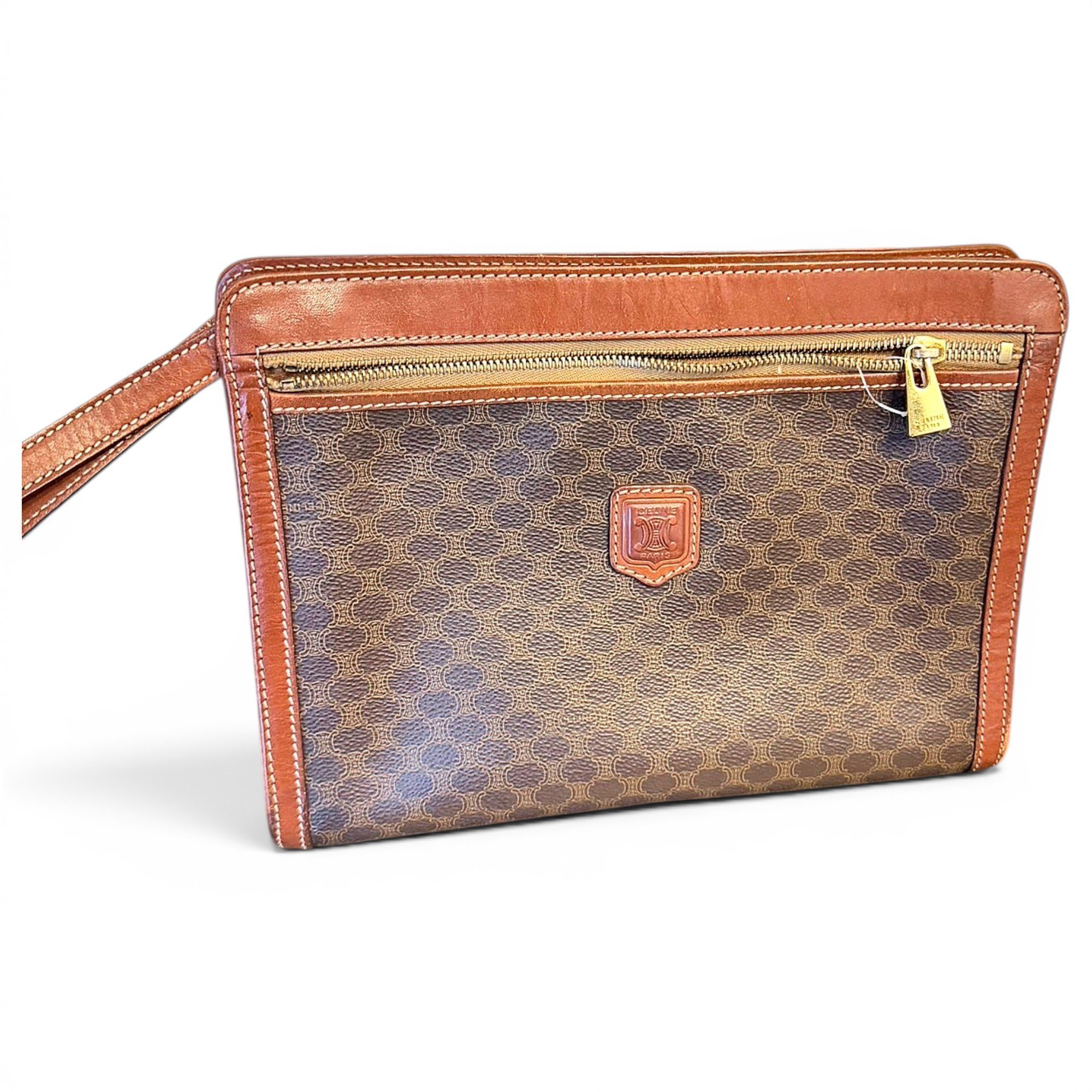 Triomphe Vintage leather clutch bag