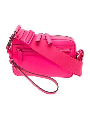 GG Embossed Crossbody Bag