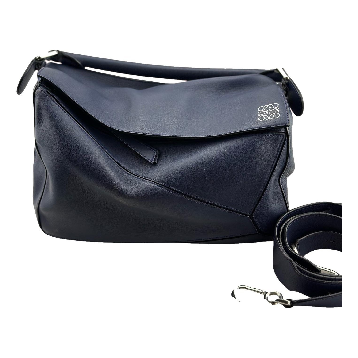 Puzzle leather handbag