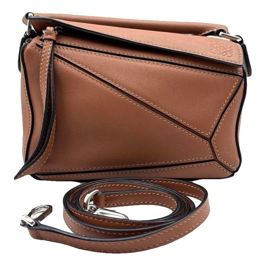 Puzzle leather handbag