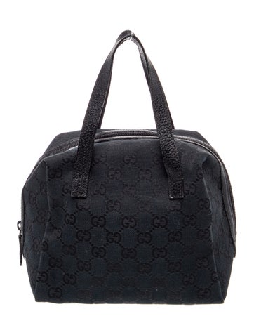GG Canvas Top Handle Bag Medium