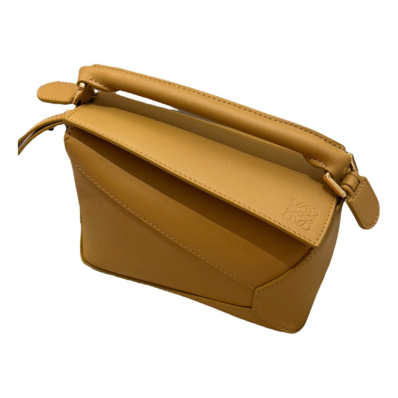 Puzzle leather handbag