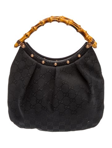 GG Canvas Top Handle Bag