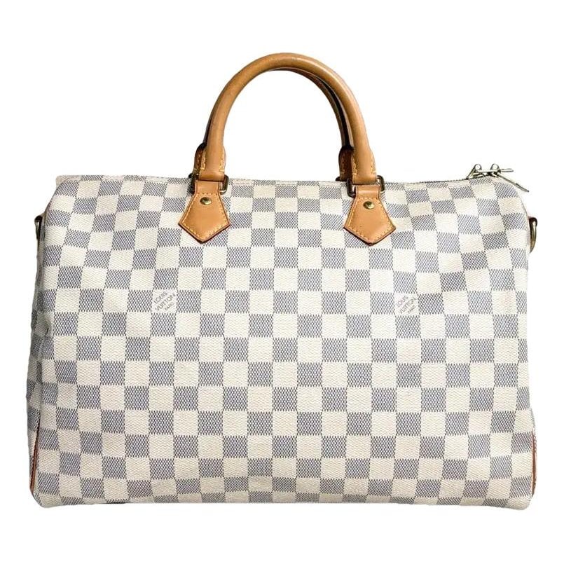 Speedy vinyl crossbody bag