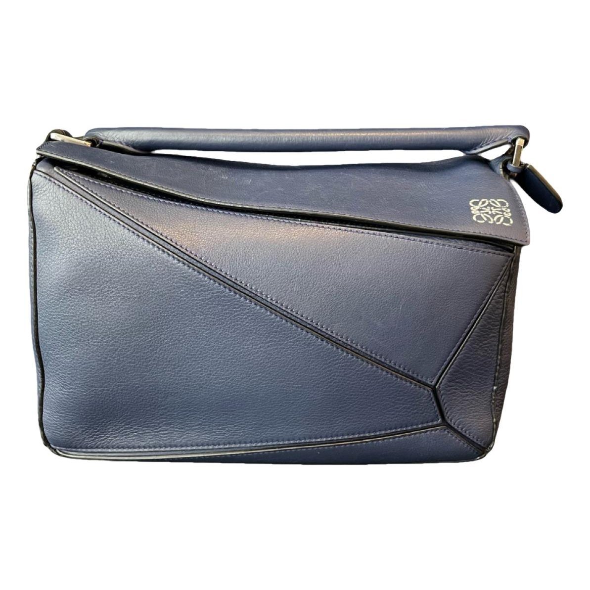 Puzzle leather handbag