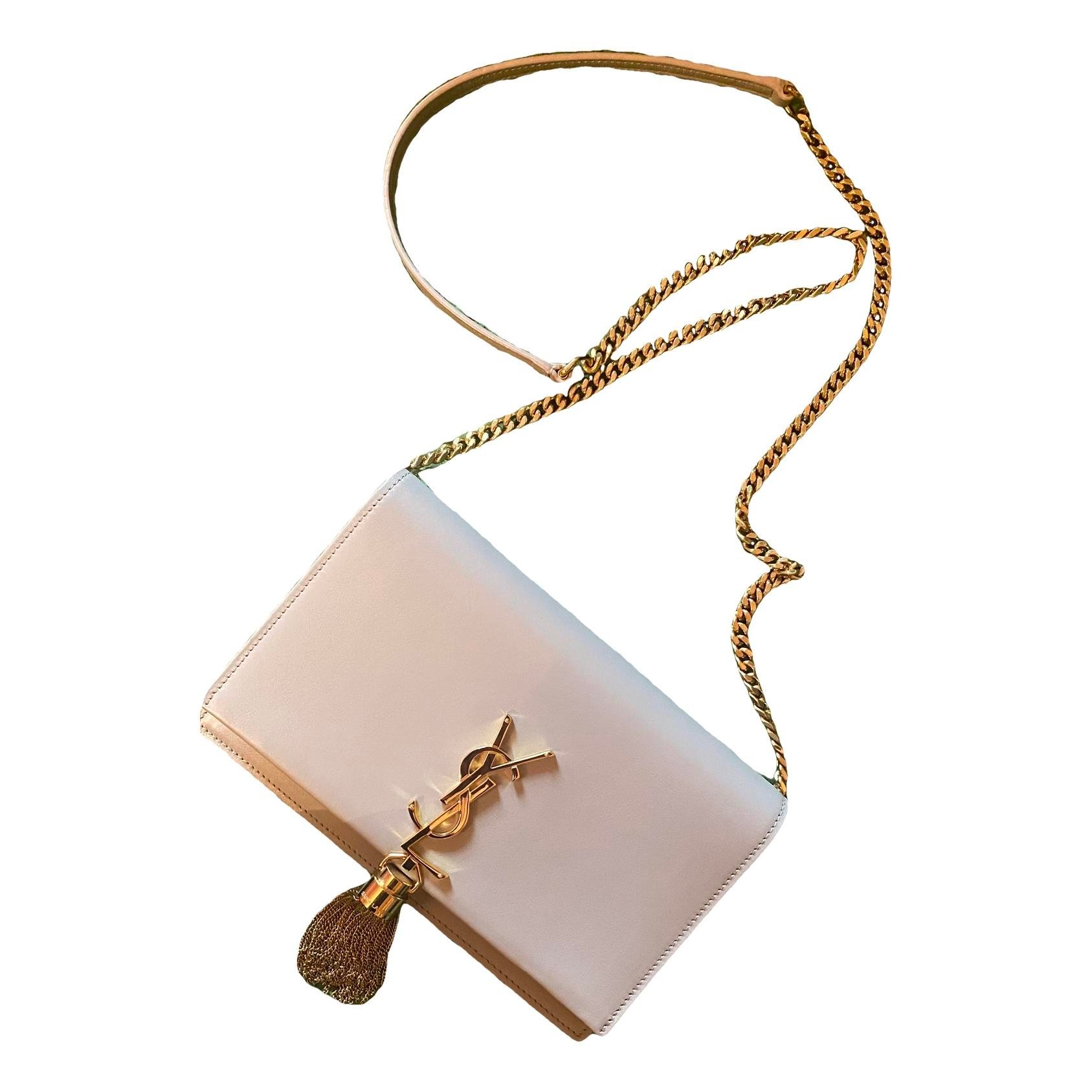 Kate monogramme leather clutch bag
