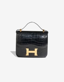 Hermes 
		Constance 24 Alligator Mississippi Black / Rouge Grenat    