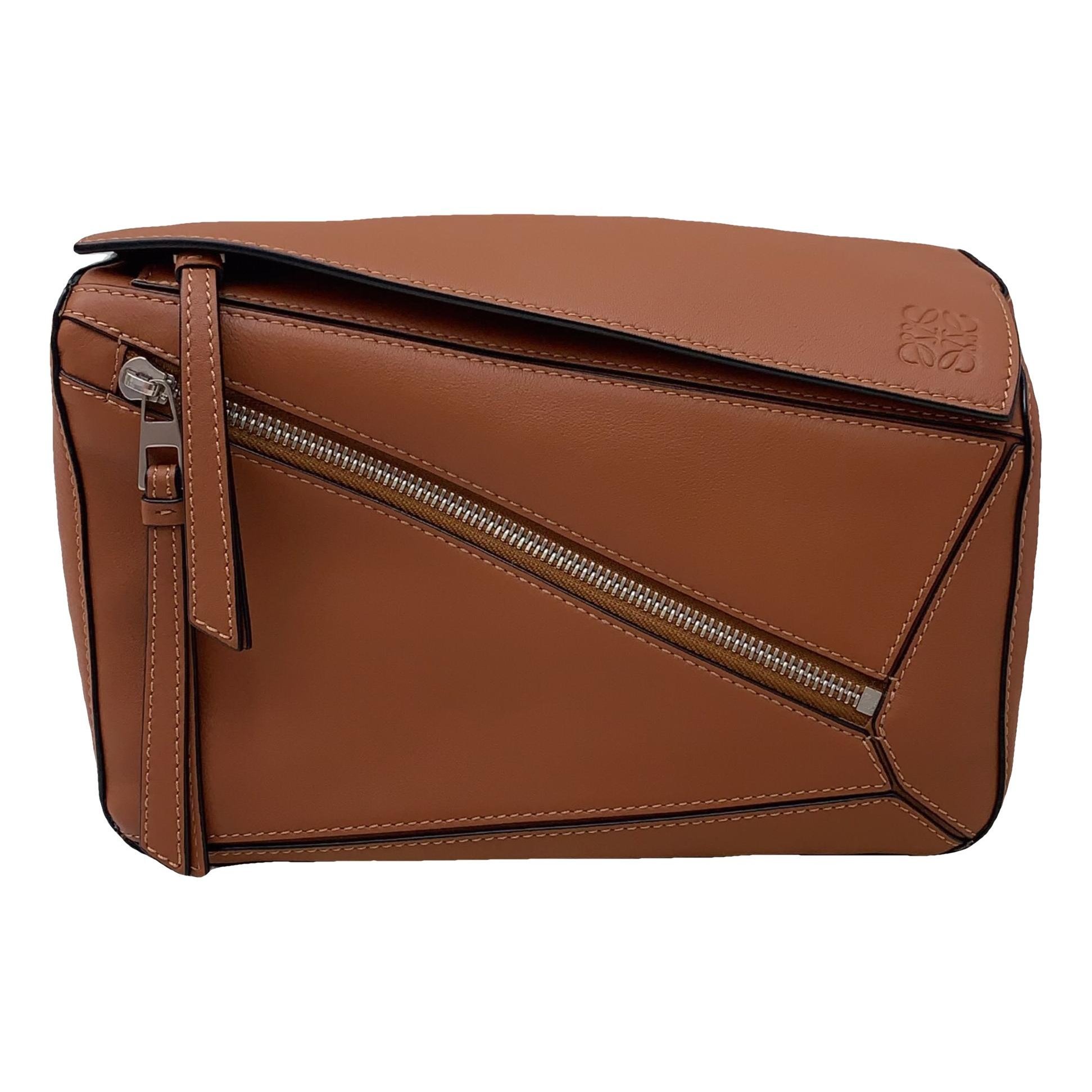 Puzzle leather handbag