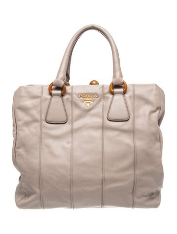 Signature Top Handle Bag