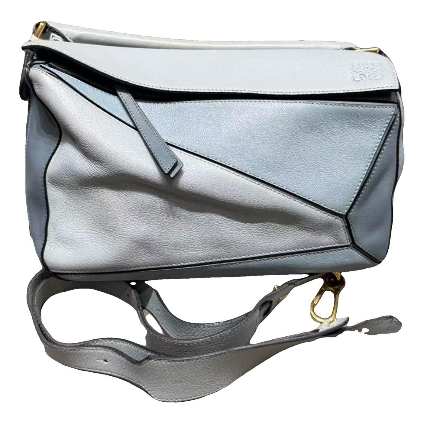 Puzzle leather handbag