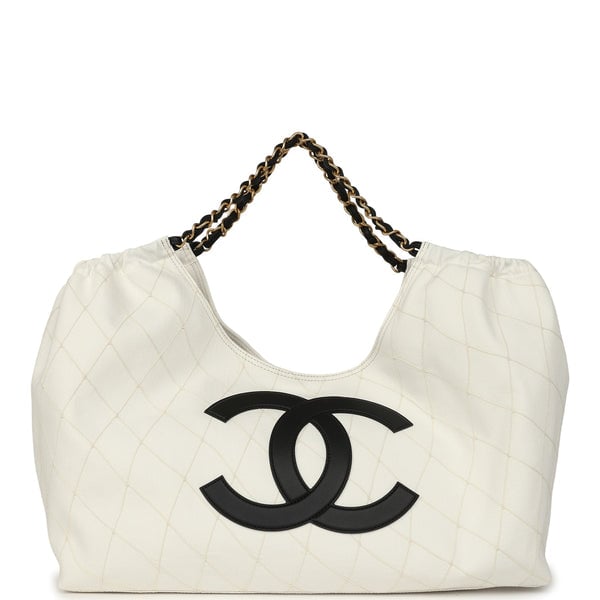 Chanel Maxi Coco Beach Cambon Hobo Bag White Denim and Black Calfskin Brushed Gold Hardware