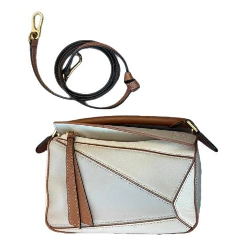 Puzzle leather handbag