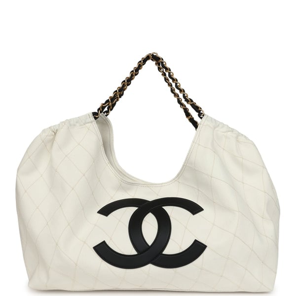 Chanel Maxi Coco Beach Cambon Hobo Bag White Denim and Black Calfskin Brushed Gold Hardware