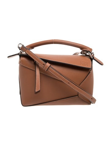 Leather Puzzle Mini 2024