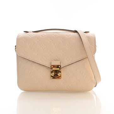Calfskin Empreinte Pochette Métis