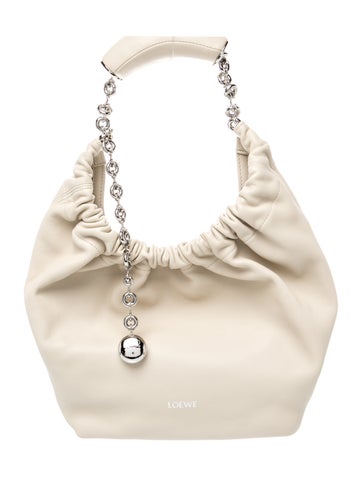 Leather squeeze bag Small 2024