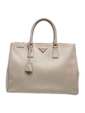 Enameled Metal Triangle Top Handle Bag