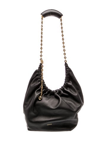 Leather squeeze bag Small 2023