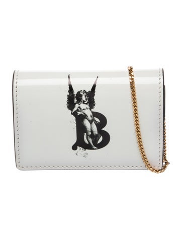TB Monogram Clutch