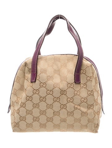 GG Canvas Top Handle Bag