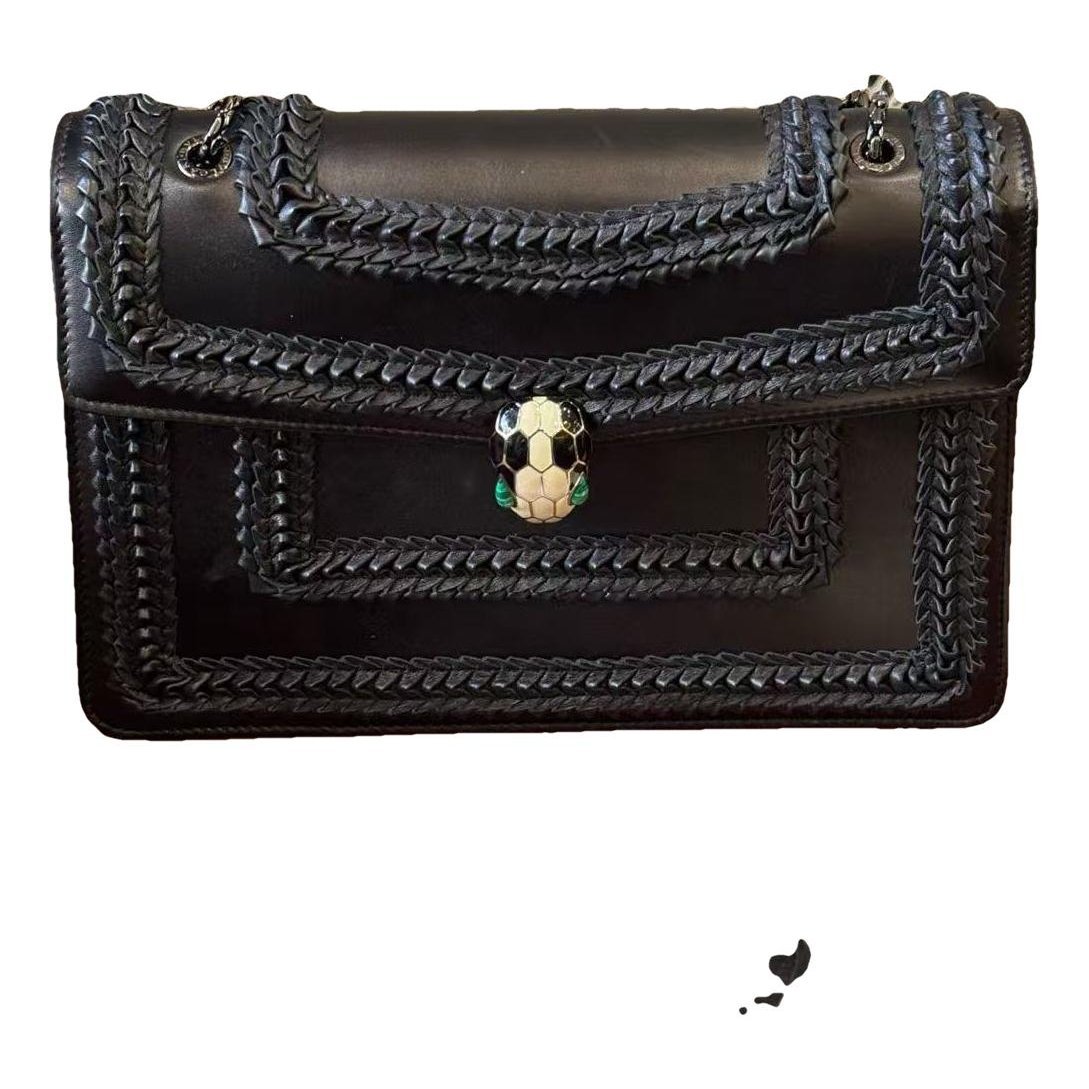 Serpenti leather handbag