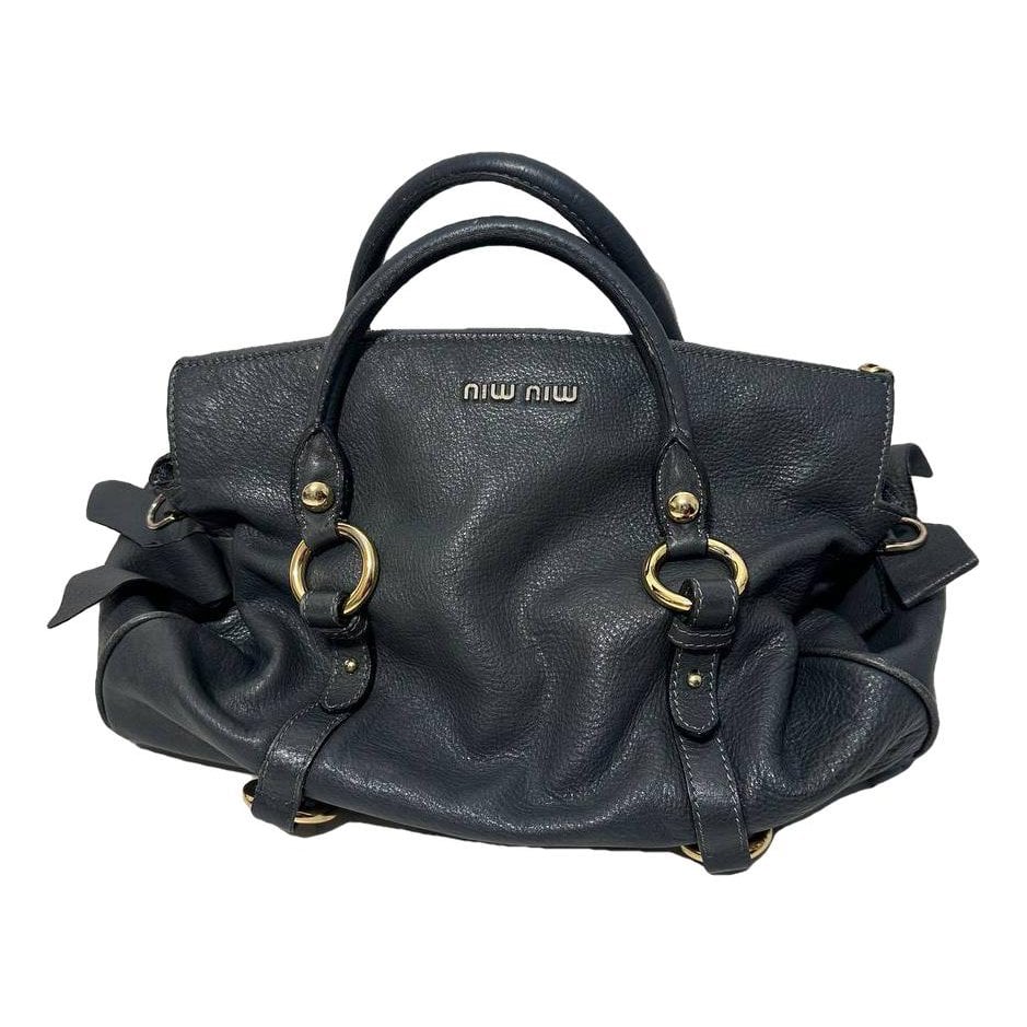 Bow bag leather clutch bag