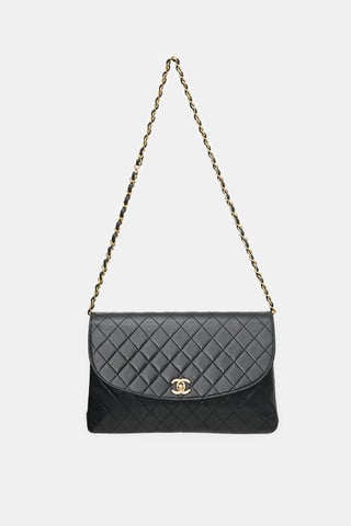 Vintage Quilted Leather Curved Flap Bag