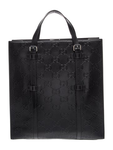 GG Embossed Top Handle Bag