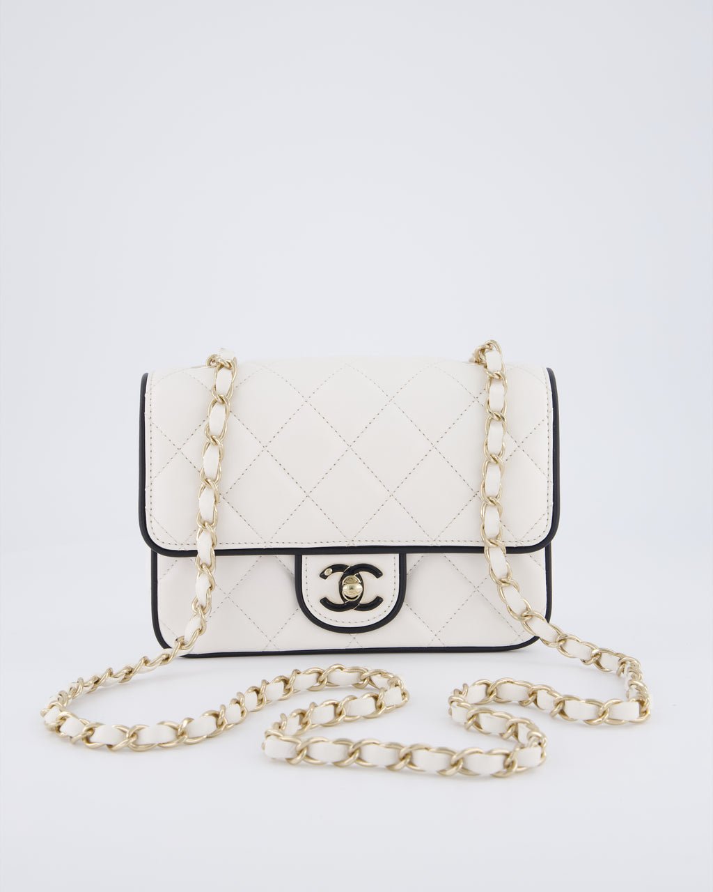 Chanel White, Black Trim Flap Bag in Lambskin Leather with Champagne and Enamel Hardware