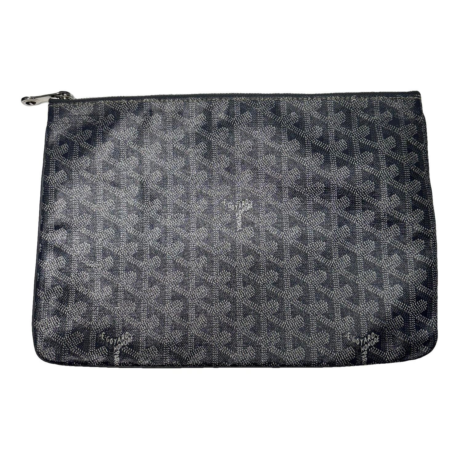 Sénat leather clutch bag