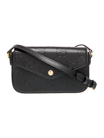 GG Embossed Crossbody Bag