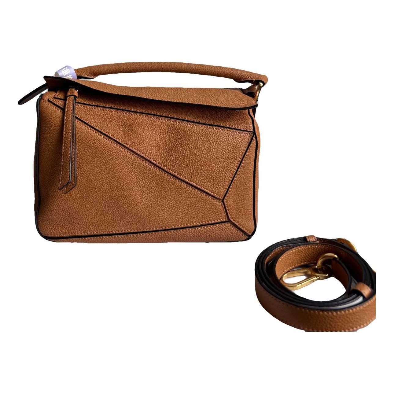 Puzzle leather handbag