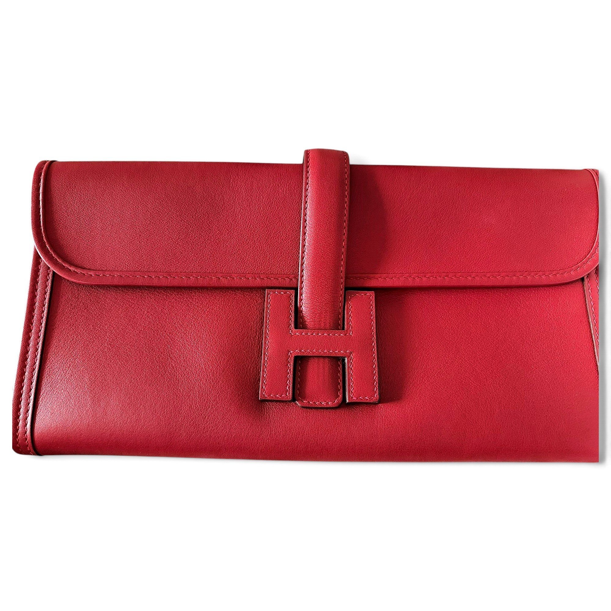 Jige leather clutch bag